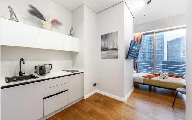 Апартаменты Комфортная студия на 35 этаже башни Оko