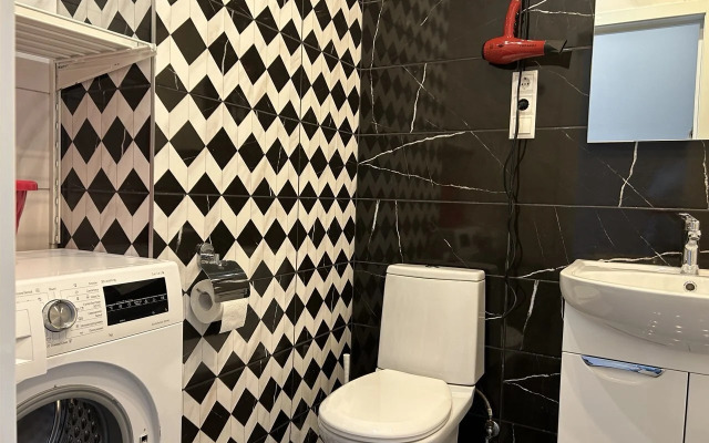 Na Volzhskoy 32a Apartments