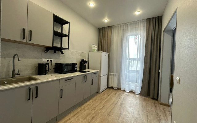 Апартаменты Уютная Студия с Балконом