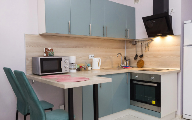 Uyutnaya Studiya Rose v PtzHome Flat