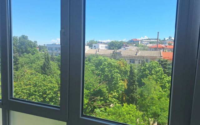 V Tsentre Goroda Flat