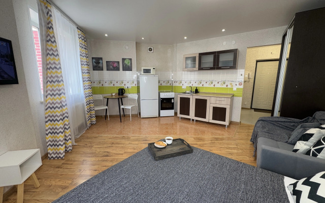 Квартира Уютна студия не далеко от зоопарка.