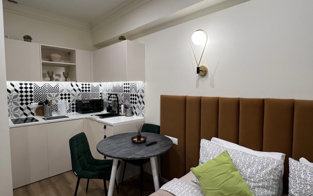 Апартаменты Уютная студия на Рижском