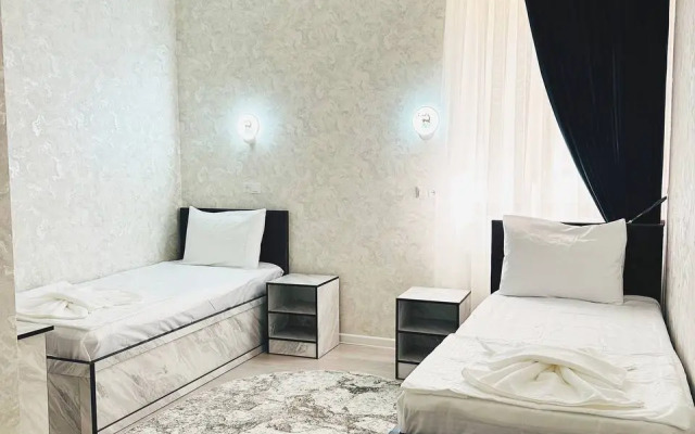 Hotel Status Inn