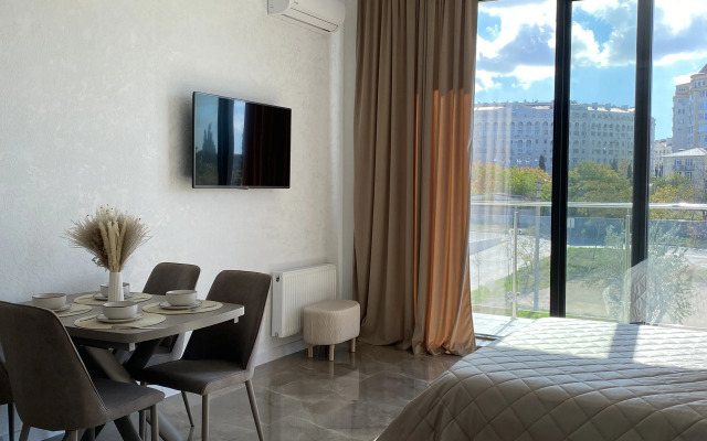 Апартаменты Абсолютно новый апартамент в 50 метрах от моря