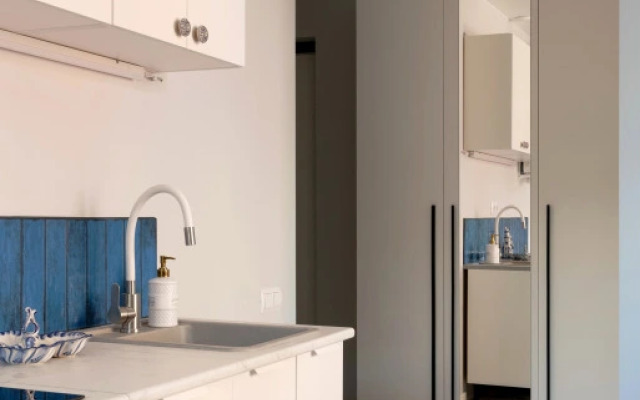 Стильная интерьерная студия 4flats Гжель в Адмиралтейском районе рядом с метро Московские ворота в ЖК Галактика Премиум для отпуска и командировки