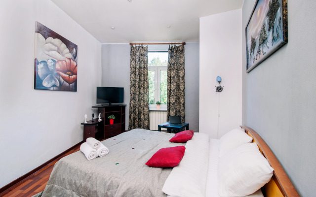 V Tsentre Goroda Apartments