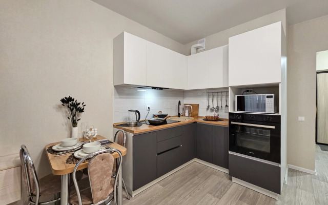 Квартира Уютная студия в тихом участке города