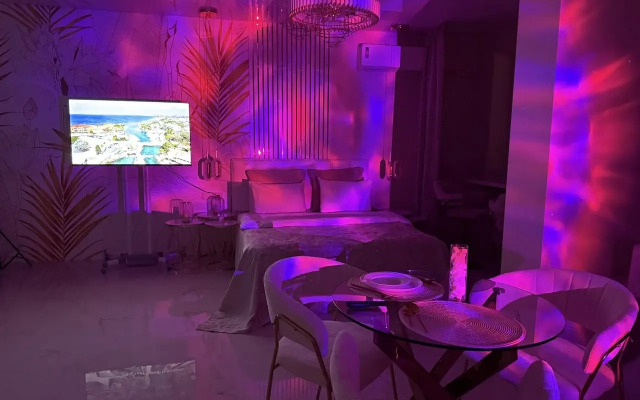 Апартаменты Атмосфера Комфорта Студия Орхидея