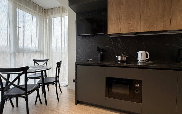 Апартаменты Уютная студия с красивым видом на горы