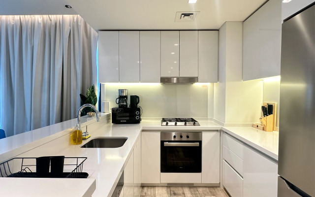 Апартаменты Vserve Modern Oasis: Canal & Burj Views