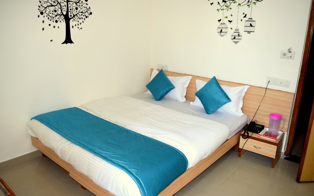 D Veeray Hotel by Sky Stays