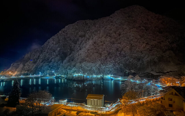 Апартаменты в Окружении Гор и Озера