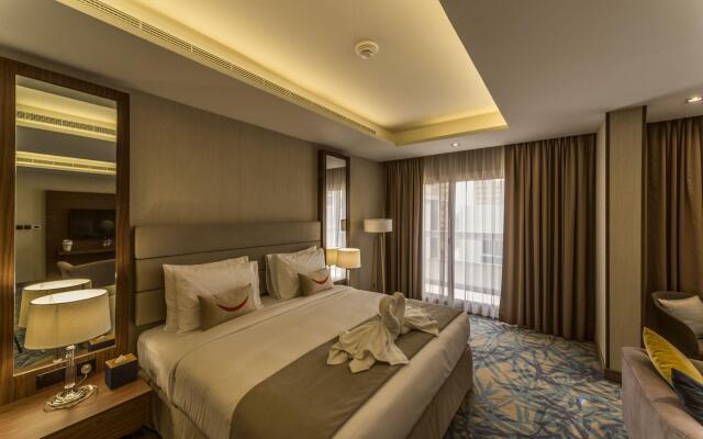 Отель Mena Plaza Hotel Albarsha