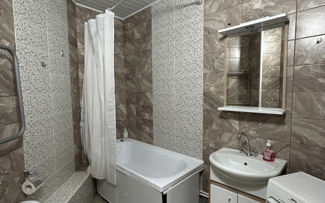 Na Naberezhnoy 122/4 Apartments
