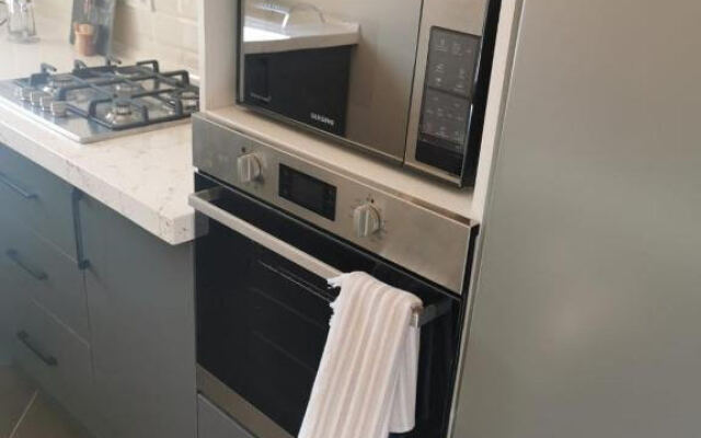 V Tsentre Baku 2 Apartments