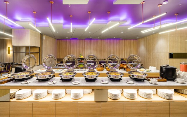 Отель Quest Hotel Prime Pemuda