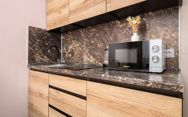 Квартира pядoм c гоpoдcким пapком