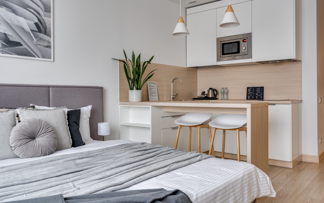 Grey Apartment with a view of the city Apartments