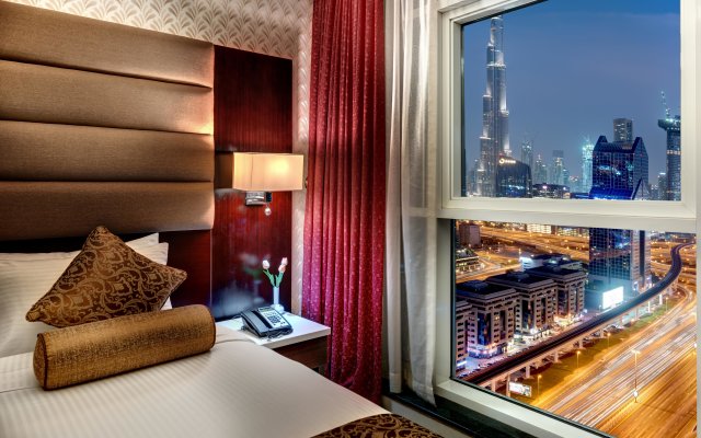Апартаменты Emirates Grand Hotel Apartments