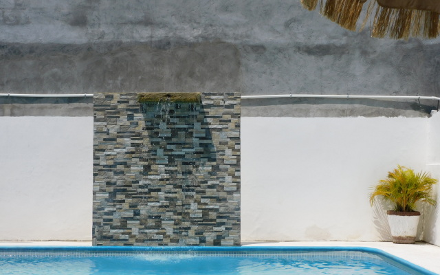 Отель Casa de Huespedes Nayomi By Rotamundos