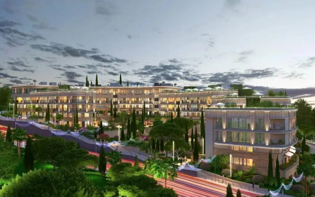 Dzhunior II v otele Grand Cascade Apartments