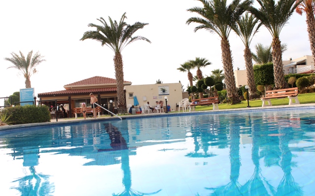 Green Oasis Beach Apartments