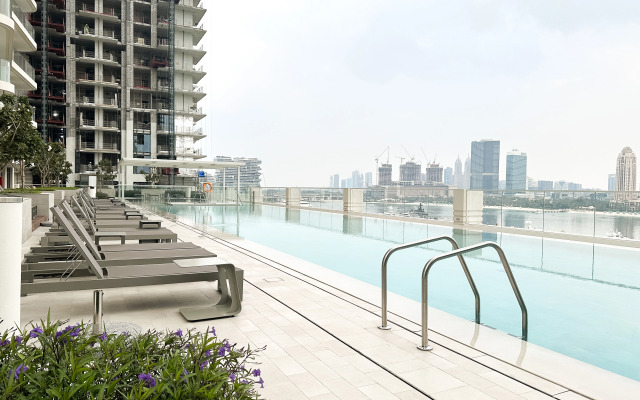 Апартаменты Keyrock Living Seaview Stay at Emaar Beachfront