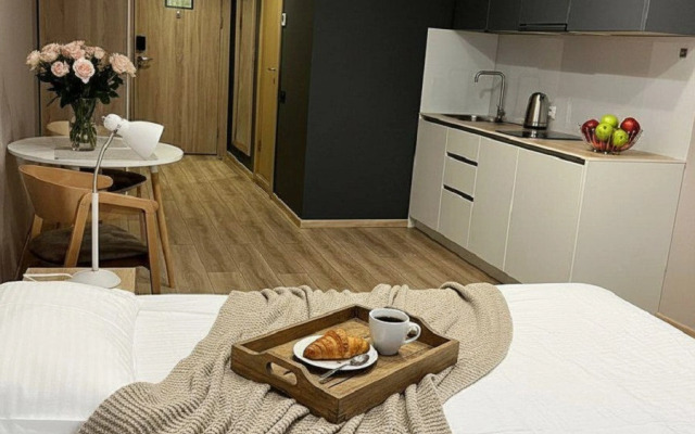 Апартаменты Уютная светлая студия в центре