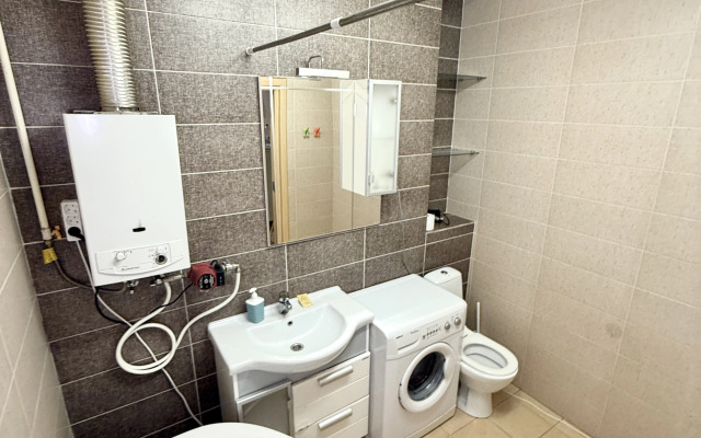 Апартаменты Уютные трехкомнатные в самом сердце города