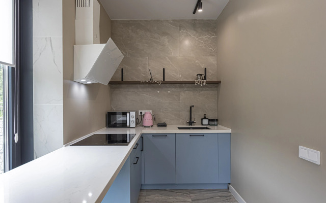 V Tsentre Goroda Apartments