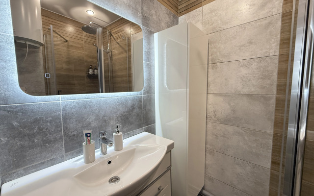 V Samom V Serdtse Tyumeni Na Tsvetnom Bulvare Apartments