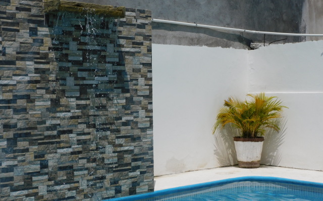 Отель Casa de Huespedes Nayomi By Rotamundos