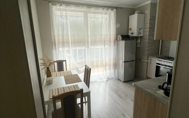 Апартаменты с видом на сосновый лес