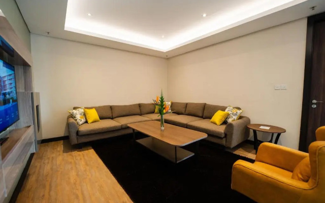 Отель Trademark Suites at Enaki Town