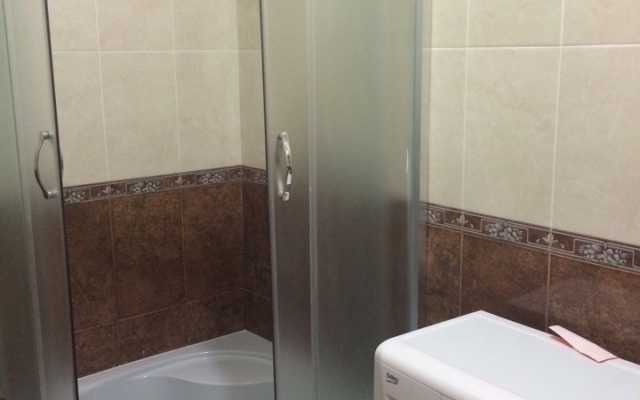 V Tsentre Goroda Apartments