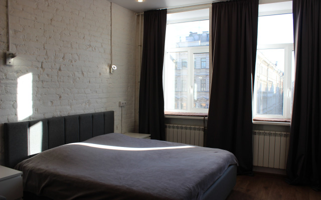 Studiya S Kaminom Nevskij 112 Apartments