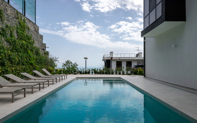 Taunkhaus v Sochi  sobstvennym Basseynom Apartments