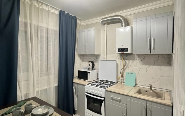 Квартира Тихая уютная студия вблизи от центра города