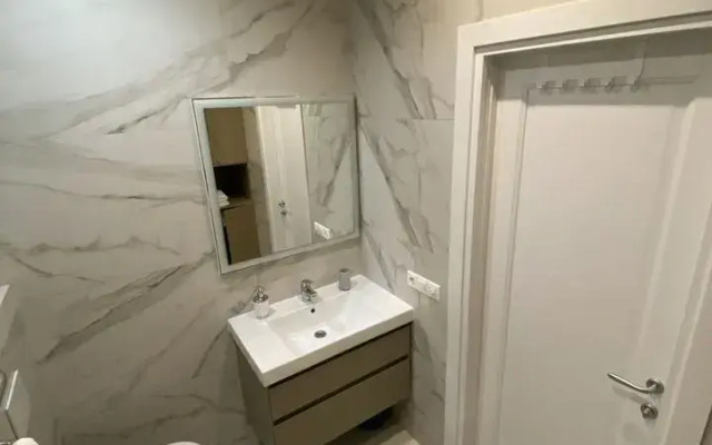 Na Deputatskoy 10 Apartments