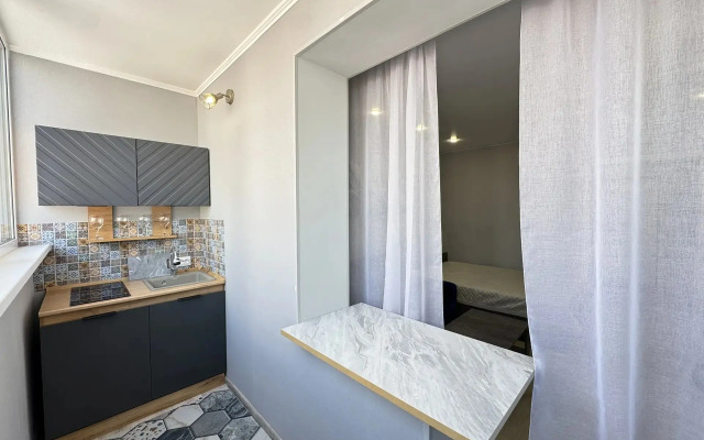 Апартаменты Уютная студия в развитом районе города