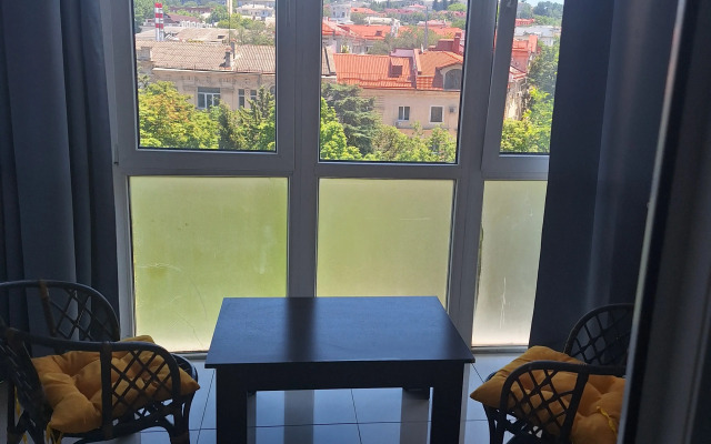 V Tsentre Goroda Flat