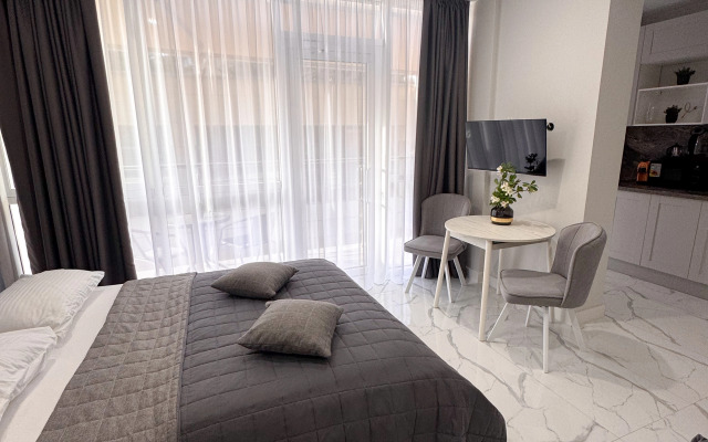 Orange Apart V Tsentre Sochi Na Navaginskoy Apartments