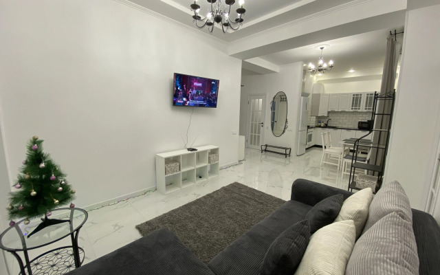 V Tsentre Kurorta S 3 Spalnyami Apartments