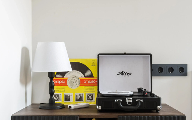 Квартира New Horizon Art Vinil 36 с дизайном бутикотеля и виниловым проигрывателем