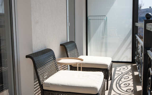 Studiya s balkonom Apartments