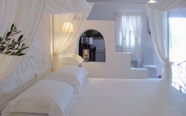 Отель Porto Scoutari Romantic Hotel & Suites