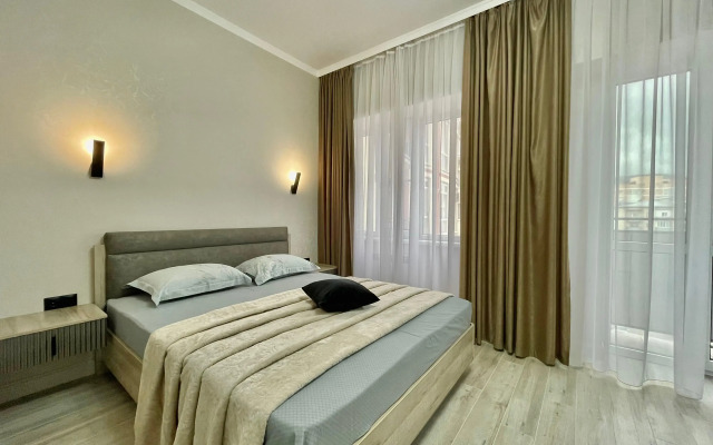 Апартаменты на Коллективной 11