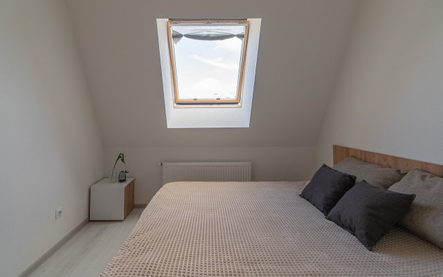 Апартаменты Двухкомнатная Квартира на Мансардном Этаже