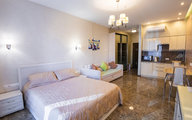 Апартаменты студия с видом на город